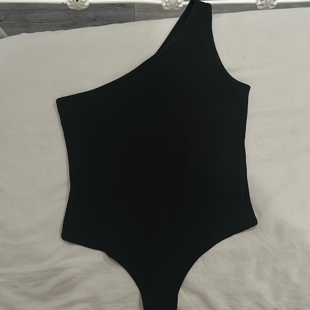 Black one shoulder body suit